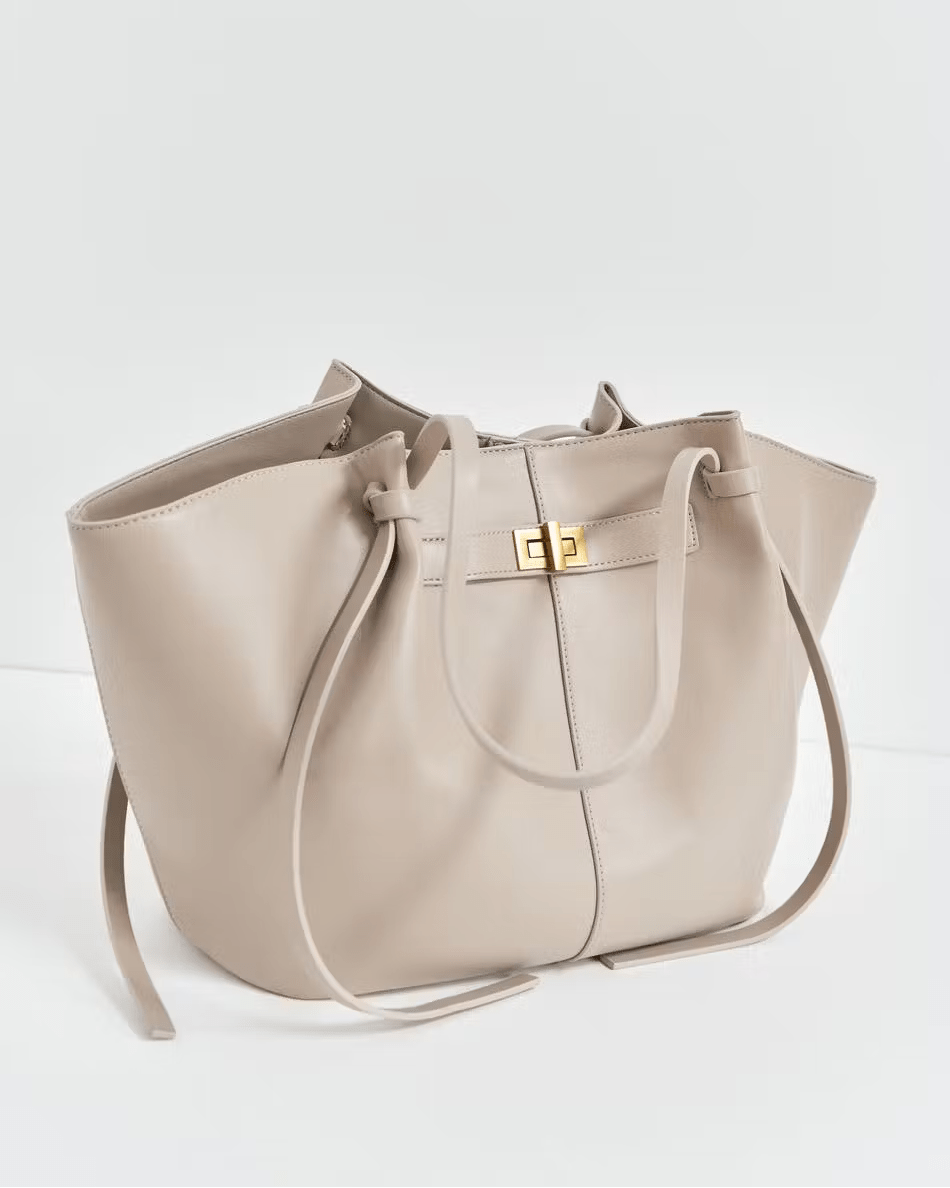 ARIA | Luxe Curve Bag — The Accessory That Says It All